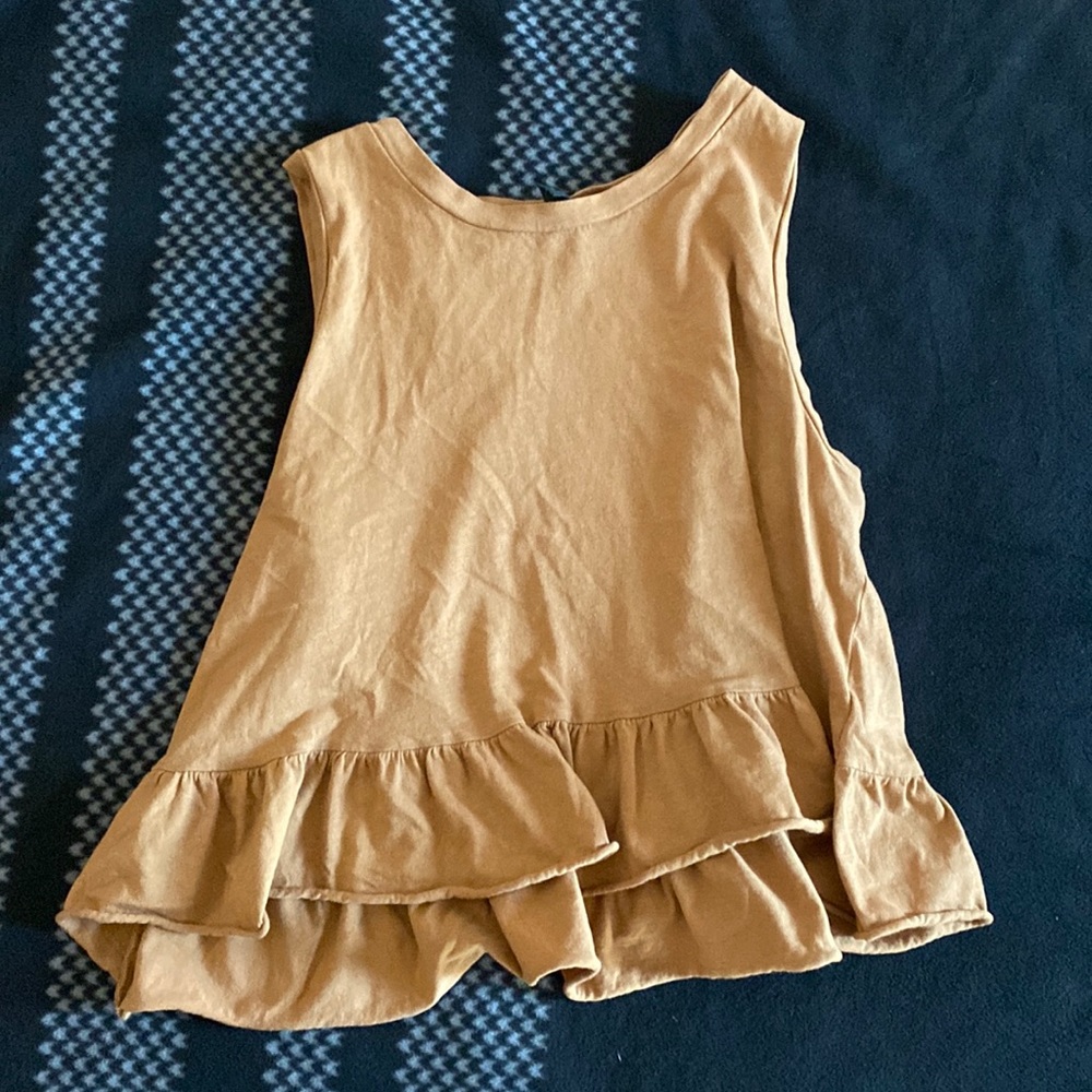 Selling a tan blouse from wild fable, size xs never been used